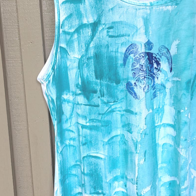 Aqua tank tunic with a honu/turtle motif available in short sleeves also or long sleeves by special request
