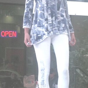 Love tunic shown with coordinating tiki print leggings