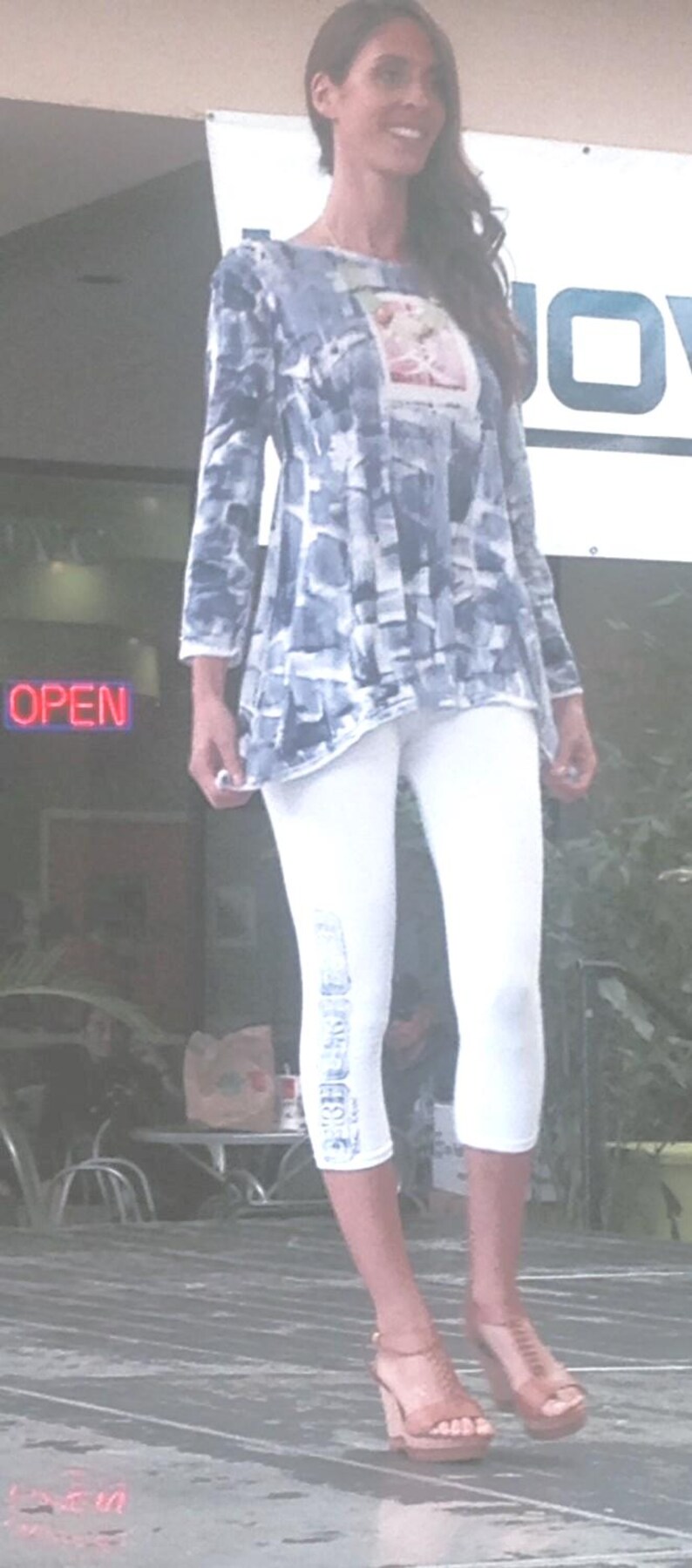 Love tunic shown with coordinating tiki print leggings