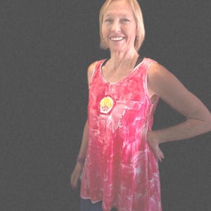 red tunic with sunrise shell