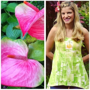 Green tunic with pineapple motif.