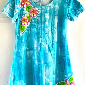 Draped plumeria on aqua