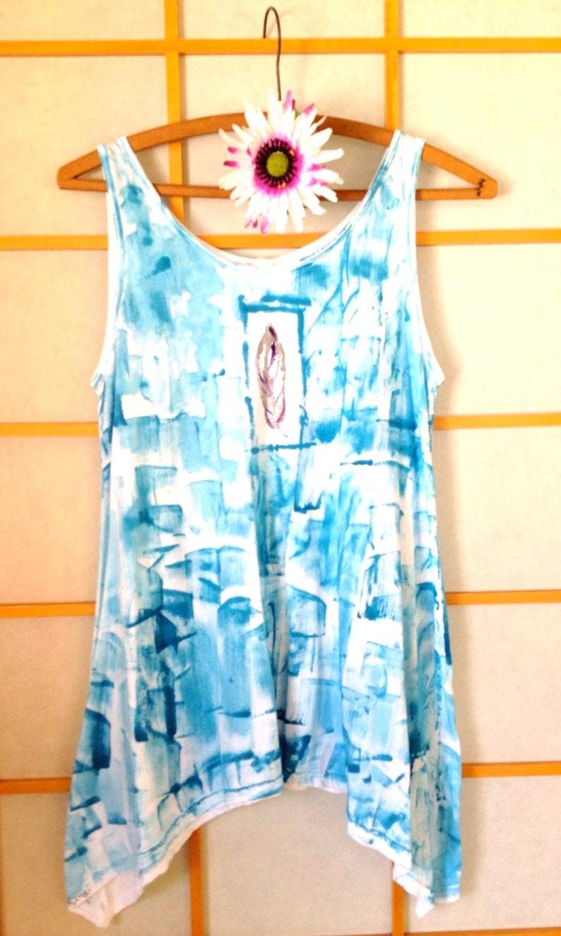 Aqua tunic with feather motif