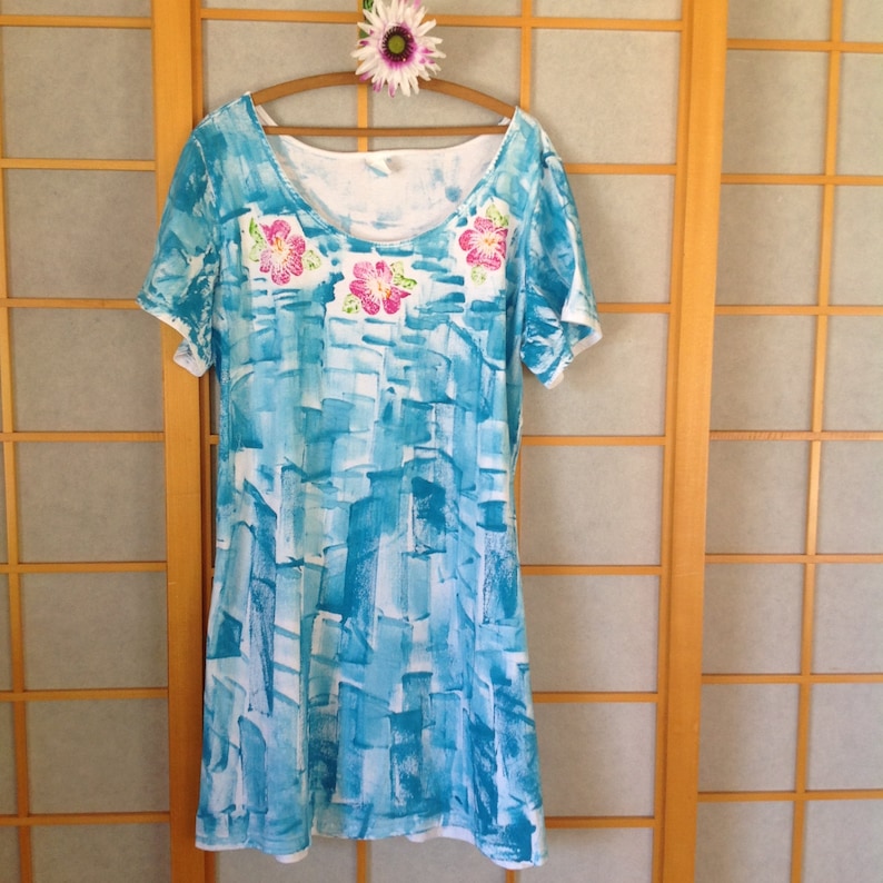 aqua dress with hibiscus lei cotton jersey with short sleeves knee length hand painted from Kaua'i Hawaii