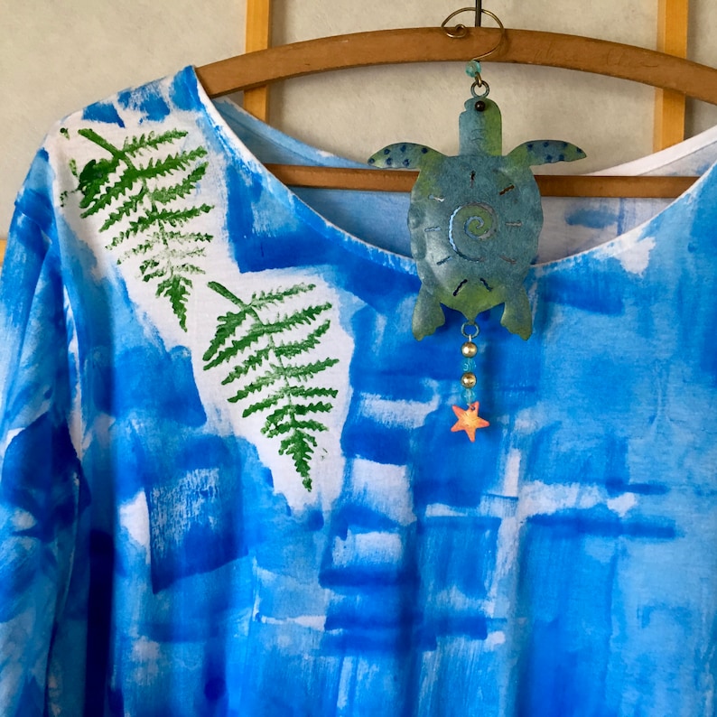 Ferns on blue