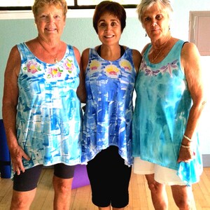 hibiscus lei, sunrise shell lei and dragonfly lei on cotton elliptical hem tunic