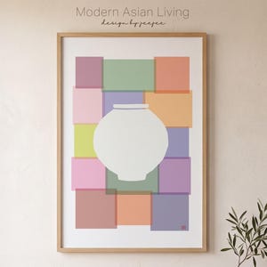 May include: A framed wall art print featuring a white ceramic jar silhouette centered over a grid of overlapping translucent colored rectangles in shades of pink, green, orange, purple, and yellow. The text Modern Asian Living design by jeejee is visible.