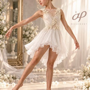 May include: A sleeveless cream-colored dress featuring a high-low hemline, a sheer bodice adorned with intricate beadwork, and delicate floral appliqués along the neckline and waist. The skirt consists of multiple layers of lightweight, flowing fabric.