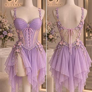 May include: A lavender corset dress featuring a sweetheart neckline, lace-up front, and thin straps. The bodice and skirt are adorned with small pink and purple floral appliqués, beads, and sequins. The skirt has a layered, asymmetrical hemline.