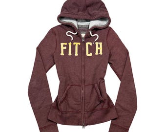 Vintage Abercrombie Fitch dames hoodie met volledige ritssluiting, maat M, bordeauxrood, met applicaties, Y2K-editie.