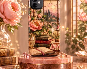 May include: A smartphone case featuring a printed illustration of a window view with a landscape, a stack of books, a teacup, and a vase of pink flowers. The design includes a soft color palette of pinks, greens, and browns, with a black camera lens cutout.
