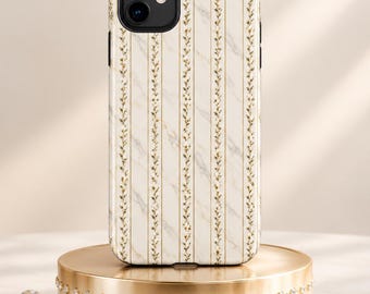 May include: A smartphone case featuring a vertical pattern of white marble stripes alternating with thin gold lines and delicate floral vines. The case has a black camera cutout at the top left corner and a smooth, glossy finish throughout the design.