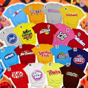May include: A collection of eighteen short-sleeved t-shirts in various colors, each featuring a different candy brand logo including AirHeads, Dots, 3 Musketeers, Starburst, York, Sour Patch Kids, Skittles, Laffy Taffy, Twizzlers, Nerds, Hot Tamales, Swedish Fish, Jolly Rancher, Dubble Bubble, KitKat, Blow Pop, Twix, and Milky Way.
