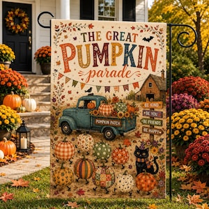 May include: A rectangular garden flag featuring a teal vintage truck carrying pumpkins, surrounded by various patterned pumpkins, a black cat, and a wooden signpost with the text BE KIND, BE YOU, BE FRIENDS, BE HAPPY, under the title THE GREAT PUMPKIN parade.