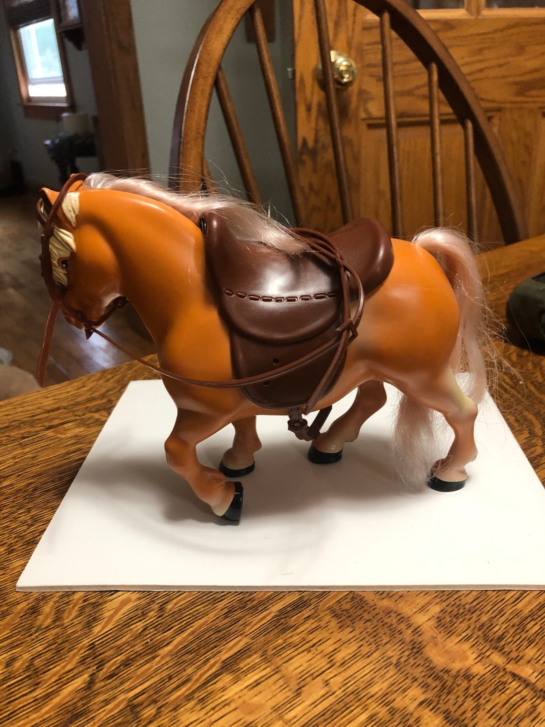 Never played with bought it for my collection-fits strung Ginny but not walker Ginnys Horse for Ginny 1980s I cant remenber who made it