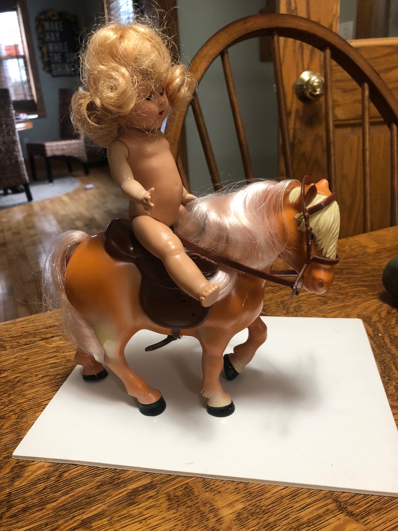 Never played with bought it for my collection-fits strung Ginny but not walker Ginnys Horse for Ginny 1980s I cant remenber who made it
