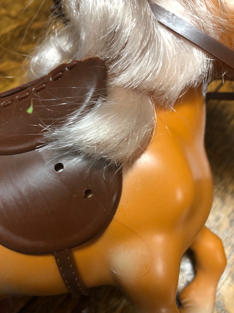 Never played with bought it for my collection-fits strung Ginny but not walker Ginnys Horse for Ginny 1980s I cant remenber who made it
