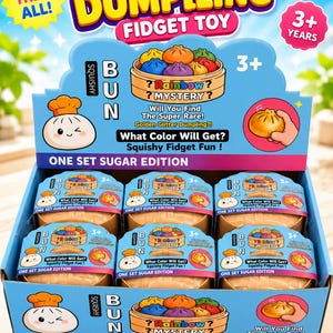 May include: A retail display box containing six Squishy Dumpling Fidget Toy sets. Each set features a bamboo steamer container holding a colorful dumpling. The packaging includes text such as Squishy Bun, Rainbow Mystery, and One Set Sugar Edition.