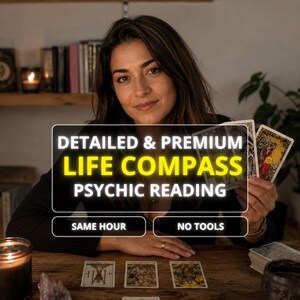 May include: A set of tarot cards featuring a psychic reading service with text that reads DETAILED & PREMIUM LIFE COMPASS PSYCHIC READING, SAME HOUR, and NO TOOLS. The cards are displayed on a wooden surface with a person holding two cards.