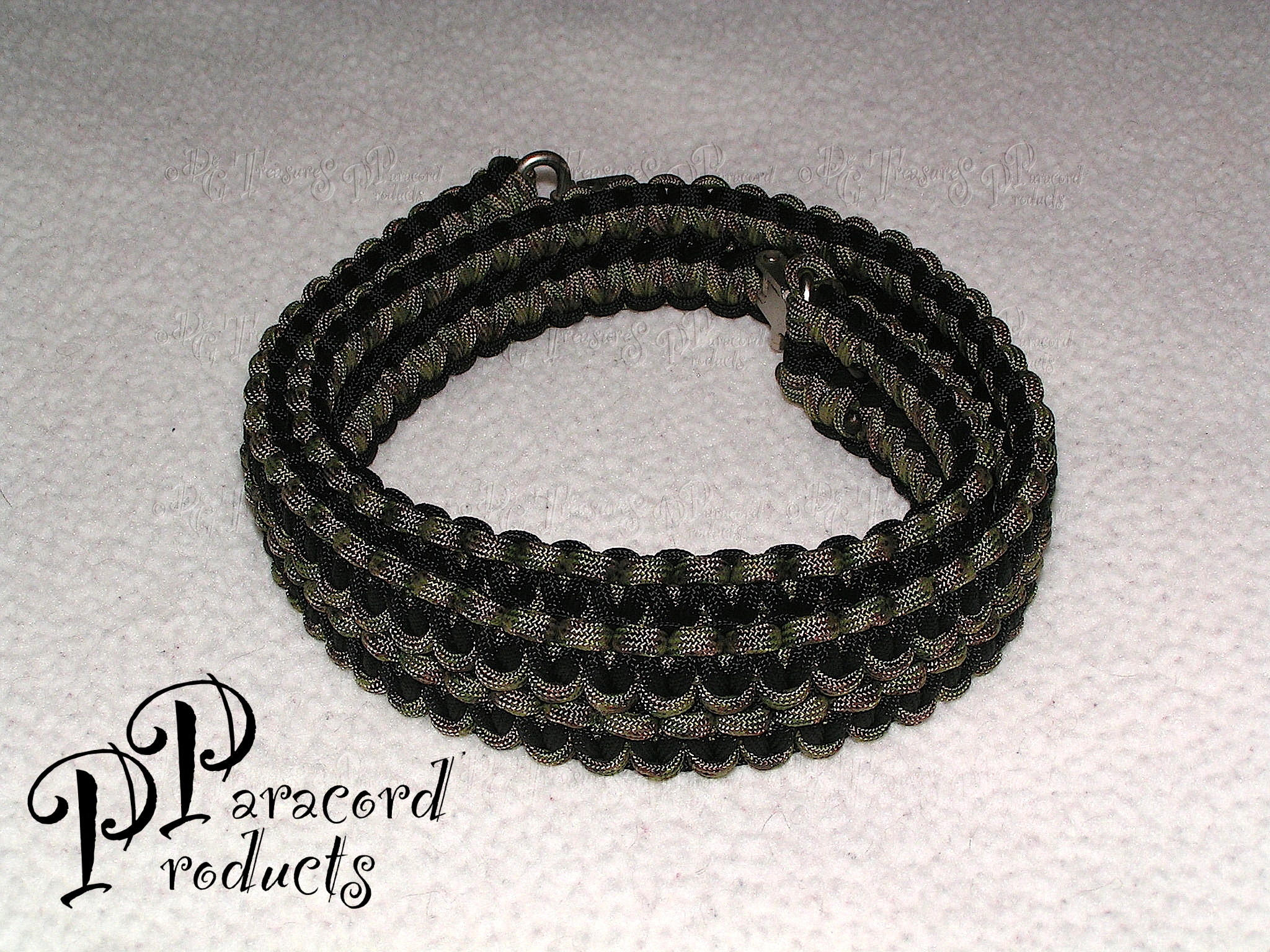 A Double Cobra Stitch Paracord Gun Sling made of Black and