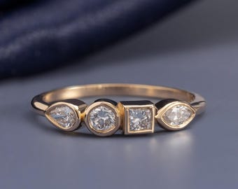 Anel com cluster de moissanita multifacetada, cravação em bisel em prata de lei 925, formato pera/redondo/princesa, ideal para casamentos e aniversários.