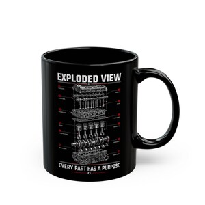 May include: A black ceramic mug featuring a white graphic of an exploded view of an internal combustion engine. The design includes numbered labels for engine components and the text "EXPLODED VIEW" and "EVERY PART HAS A PURPOSE" in white.