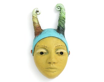 Title: "Dual Nataure"  Ceramic Face, wall art, Jacquline Hurlbert, one of a kind, unique.