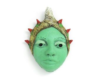 Title: "Safe Keeping"  Ceramic Face, wall art, Jacquline Hurlbert, one of a kind, unique.