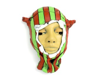 Title: "Hidden in Clear View"  Ceramic Face, wall art, Jacquline Hurlbert, one of a kind, unique.