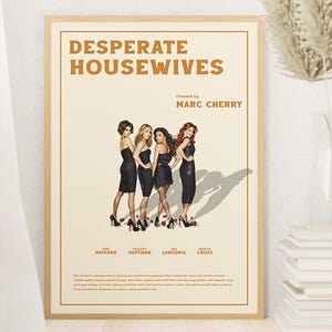May include: A framed poster for the television show Desperate Housewives featuring the title, creator Marc Cherry, and the names of actors Teri Hatcher, Felicity Huffman, Eva Longoria, and Marcia Cross above a summary of the show's plot.