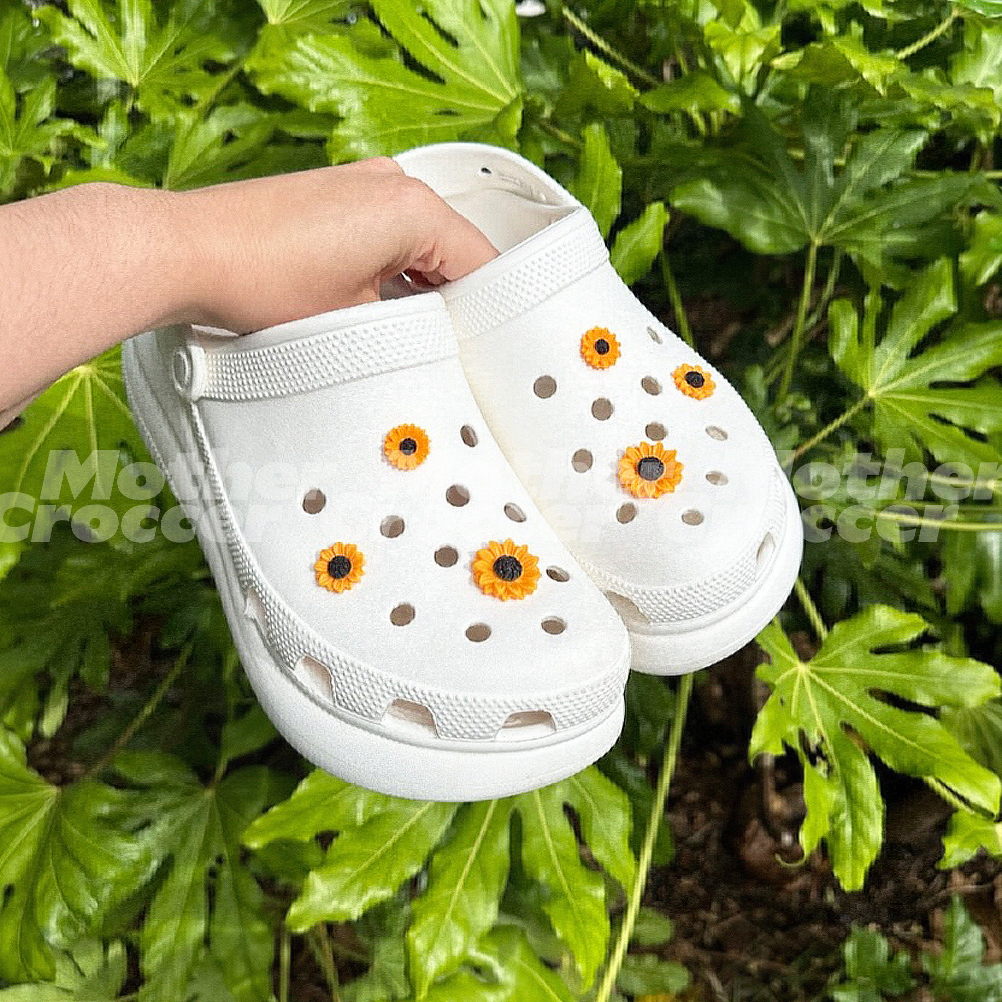 orange clog shoe with plant and flower • authentic jibbitz • crocs shoe  charms