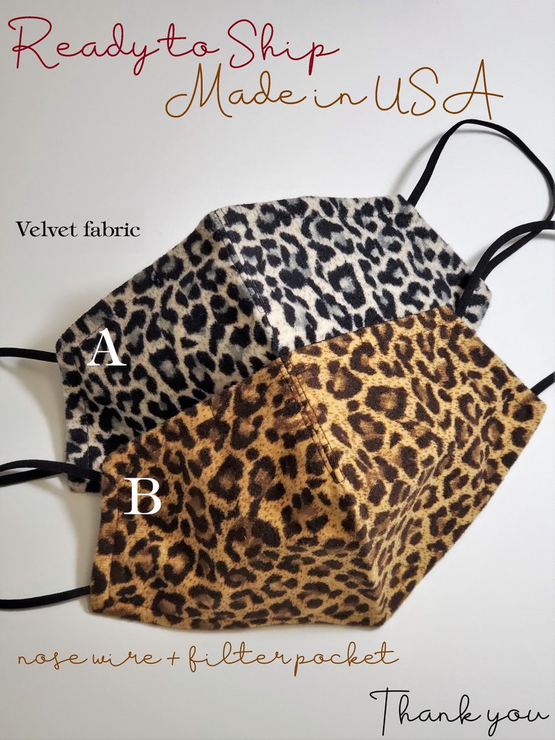 May include: Two leopard print face masks made from velvet fabric. The masks have a nose wire and filter pocket. The masks are labeled A and B. The text "Ready to Ship Made in USA" and "Thank you" are also visible.