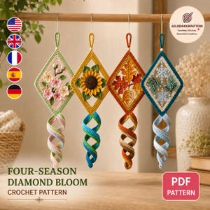 May include: Four diamond-shaped crochet ornaments hanging from a wooden rod. Each features a seasonal design: pink cherry blossoms, a yellow sunflower, orange autumn leaves, and blue snowflakes with pine needles, all with spiral tails.