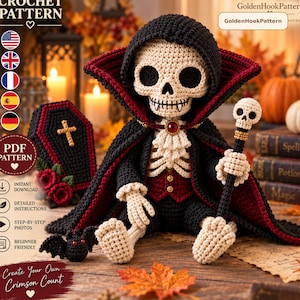 May include: A crochet pattern for a vampire skeleton doll featuring a black hooded cape with a red lining, a white ruffled shirt, a red vest, and a skull-topped staff. The set includes a small black bat and a coffin with a gold cross and red roses.