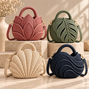 May include: Four crochet handbags with top handles and detachable shoulder straps. One is dusty rose with a lotus petal design, one is olive green with a leaf pattern, one is beige shaped like a seashell, and one is navy blue with a wave pattern.