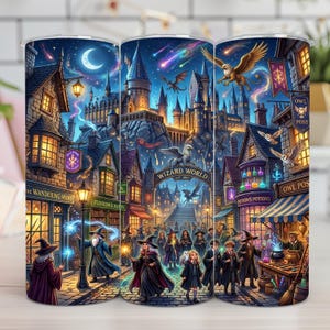 May include: A cylindrical tumbler featuring a detailed fantasy illustration of a magical village and castle at night. The scene includes wizards, witches, owls, a dragon, and a griffin under a starry sky with the text Wizard World Est 1867.