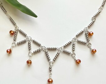 Beaded Triangle Bib Style Necklace with Orange Magma Crystal Beads