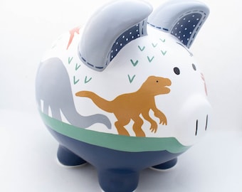 Hucha personalizada de dinosaurio jurásico en azul marino, naranja, verde y gris