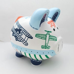 Jayce Planes Personalized Piggy bank in Navy Blue, Green and Orange with Vintage Airplanes