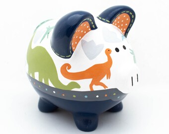 Hucha personalizada de dinosaurio jurásico en azul marino, naranja, verde y verde azulado