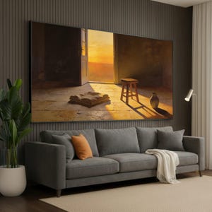 May include: A large rectangular wall art print depicting an open doorway leading to a golden sunset. The scene features a stone floor, a small wooden stool, a folded textile, and a ceramic vase, all illuminated by warm light casting long shadows.