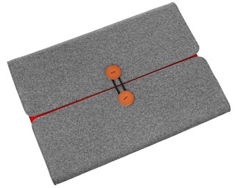 May include: Gray felt laptop sleeve with a red trim and two brown buttons. The sleeve is closed and the buttons are fastened.