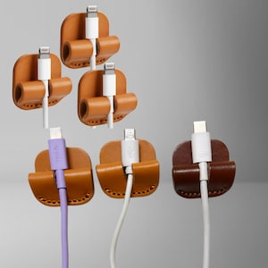 Supporto per cavi in pelle, adesivo, organizer per cavi da parete, fermacavo USB per iPhone, cavo di tipo C, micro USB, accessorio da scrivania.