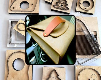 May include: A collection of wooden leather cutting dies with metal blades in various shapes, including circles and trees, surrounding a central image of a tan leather clutch with a light orange handle and a brass rivet closure.