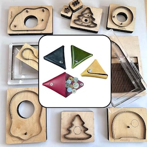 May include: A collection of wooden cutting dies with metal blades in various shapes, including trees and circles, surrounding a central image of four triangular leather coin pouches in black, green, yellow, and red, with the red pouch holding coins.