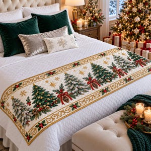 May include: A quilted bed runner featuring a repeating pattern of green Christmas trees, brown pinecones, red berries, and gold stars on a cream background. The runner has a decorative gold border and is draped across a white quilted bedspread.