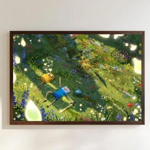 May include: A framed rectangular wall art print depicting a cartoon human character in a blue shirt and shorts lying in a vibrant green meadow with a yellow dog character, a sword, and glowing white light orbs amidst colorful wildflowers.