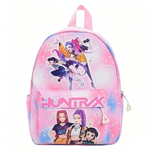 May include: A pink and blue gradient backpack featuring a graphic print of five animated characters and the text "HUNTRVX" on the front pocket. The design includes star accents and a top handle, with a zip closure on the main and front compartments.