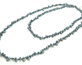 Dark grey freshwater pearl long necklace.