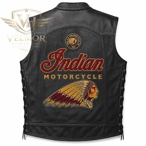 May include: A black leather vest featuring the Indian Motorcycle logo in red and gold, with a graphic of a person wearing a feathered headdress. The vest includes side lacing with black leather cords and a circular Indian Motorcycle 1901 emblem.
